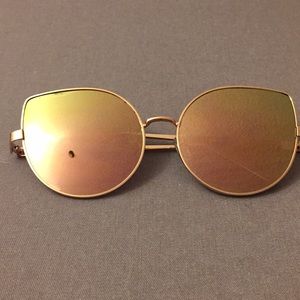 Rose gold reflective sun glasses